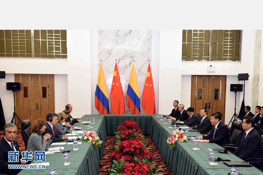 11月18日，國家主席習(xí)近平在菲律賓馬尼拉會見哥倫比亞總統(tǒng)桑托斯。 新華社記者 饒愛民 攝